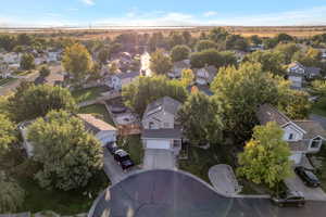 View of property location with nearby suburban area