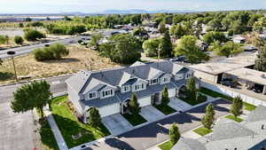Aerial perspective of suburban area with a mountainous background