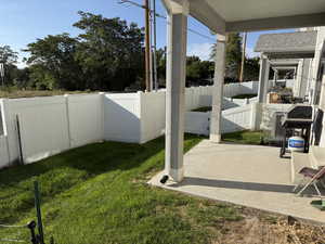 View of fenced backyard