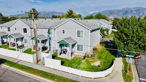 Aerial view of residential area featuring mountains