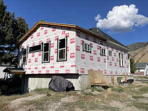 View of property exterior with a mountain view