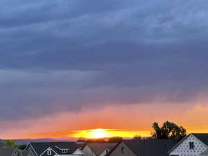 View of mountain backdrop with nearby suburban area
