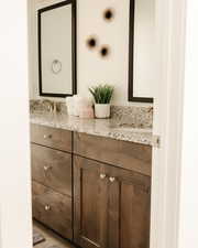 Bathroom featuring double vanity