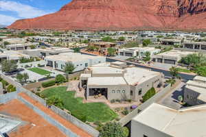 Aerial view of residential area featuring mountains