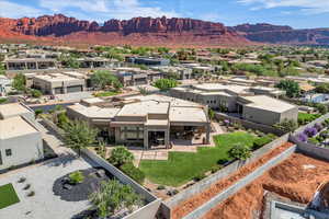 Aerial view of residential area featuring mountains