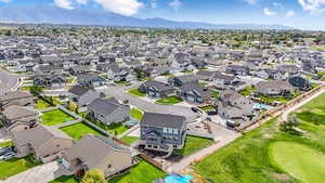 Aerial view of residential area with a mountain backdrop