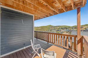 Wooden deck featuring a mountain view