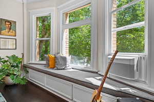 Detailed view of wood finished floors and ornamental molding