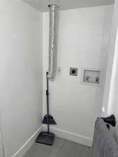 Laundry area featuring washer hookup and electric dryer hookup