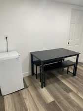 Dining space featuring baseboards and light wood-style flooring
