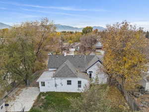 View from above of property with a mountain backdrop