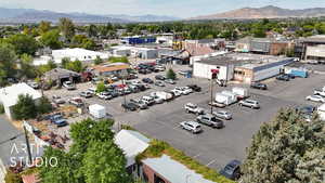 Bird's eye view of mountains and a commercial area