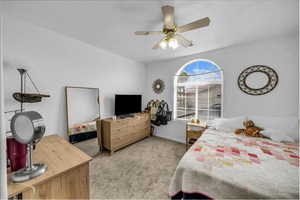 Bedroom with light carpet and ceiling fan