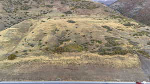 View of mountain backdrop with rural landscape
