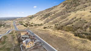Aerial overview of property's location with a mountainous background