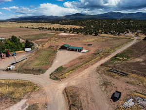Overview of rural landscape featuring a mountain backdrop