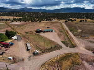 Aerial view of sparsely populated area featuring a mountain backdrop
