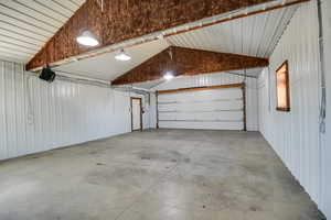 Garage featuring metal wall