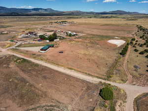 View of property location with rural landscape and mountains