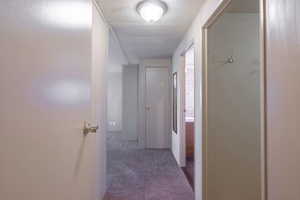 Hall featuring carpet