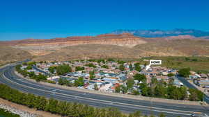 Aerial view of residential area with a mountain backdrop