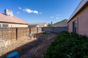 View of fenced backyard