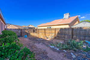View of fenced backyard