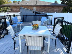 Wooden deck with outdoor dining space