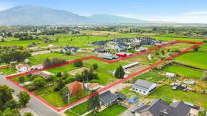 Aerial view of residential area featuring mountains