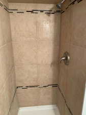 Bathroom featuring a stall shower
