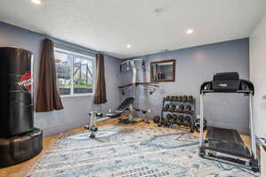 Workout room with recessed lighting