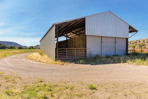 View of outdoor structure featuring a mountain view and an exterior structure