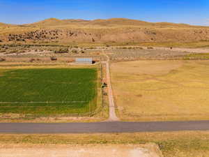 Aerial view of sparsely populated area featuring a mountainous background
