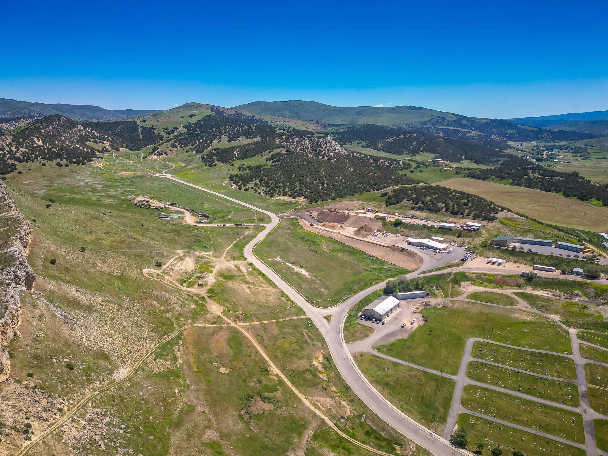 Aerial overview of property's location with a mountain backdrop