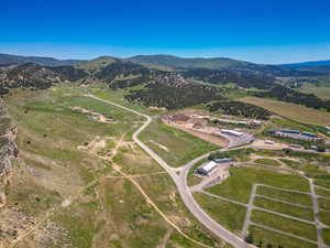 Aerial overview of property's location with a mountain backdrop