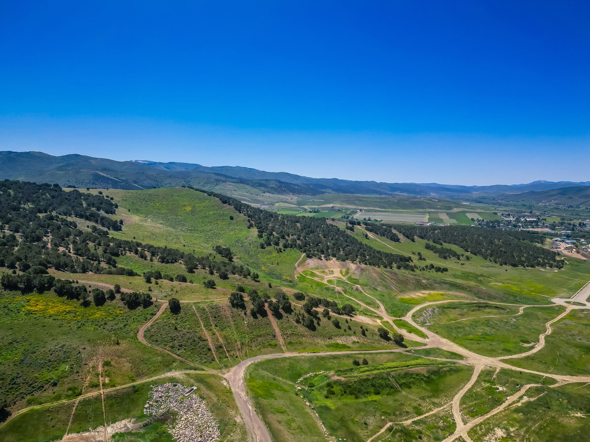 Drone / aerial view of a mountainous background