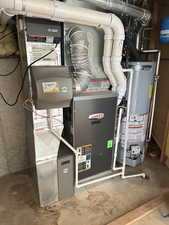 Utilities featuring gas water heater and heating unit