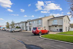 Uncovered parking lot with a residential view