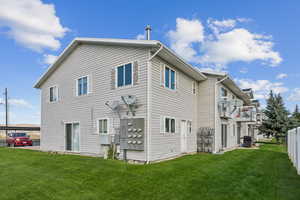 Rear view of house featuring a balcony