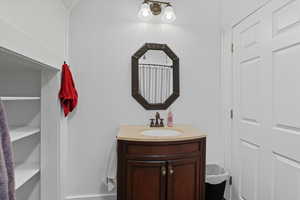 Bathroom featuring vanity and a shower with shower curtain