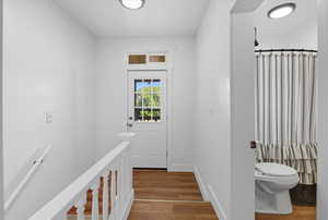 Doorway with wood finished floors