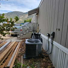 Exterior view of a mountainous background and a cooling unit