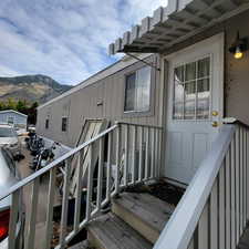 Doorway to property with a mountain view