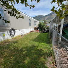 View of yard with a mountain view