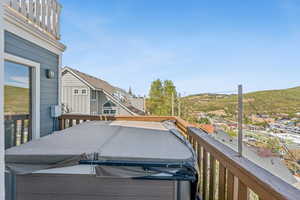 Deck featuring a hot tub