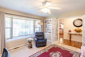 Sitting room featuring french doors