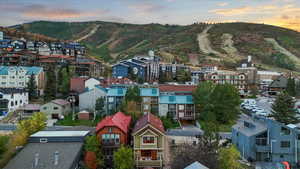 Aerial perspective of suburban area featuring mountains