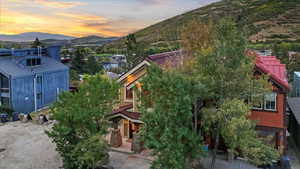 View of subject property with mountains