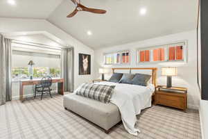 Bedroom with an office area, vaulted ceiling, a ceiling fan, carpet floors, and recessed lighting