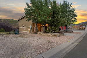 View of property hidden behind natural elements